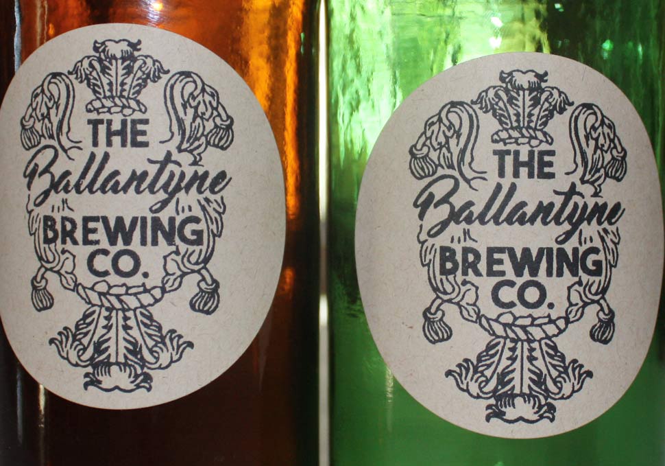 Graphic design, detail of bottles with Ballantyne Brewing Co. stickers by Maya Walker