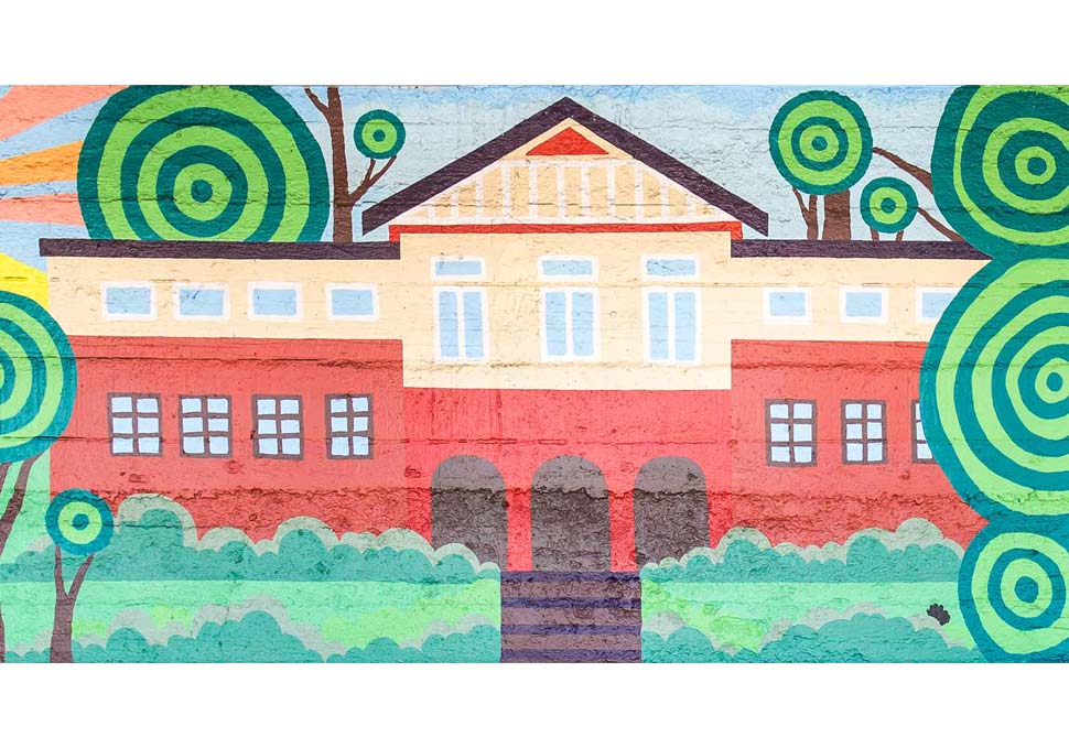 Art, detail of mural painted at bus stop featuring brightly coloured landscape of Newmarket, by Maya Walke